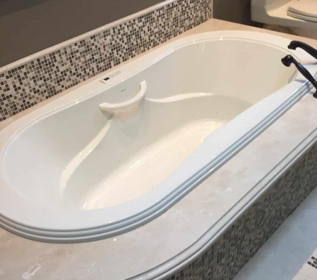 beautifully repaired marble bathtub surround