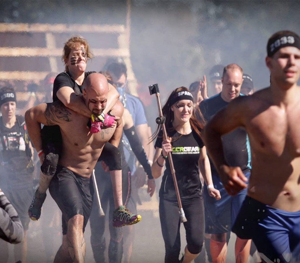 Team Ilene Boyar conquering obstacles at Spartan Race Tampa.
