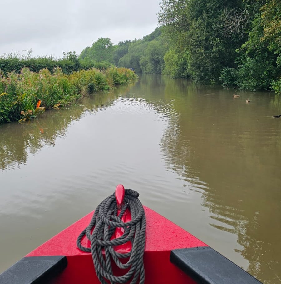 a boat on a river with a rope tied to a rope