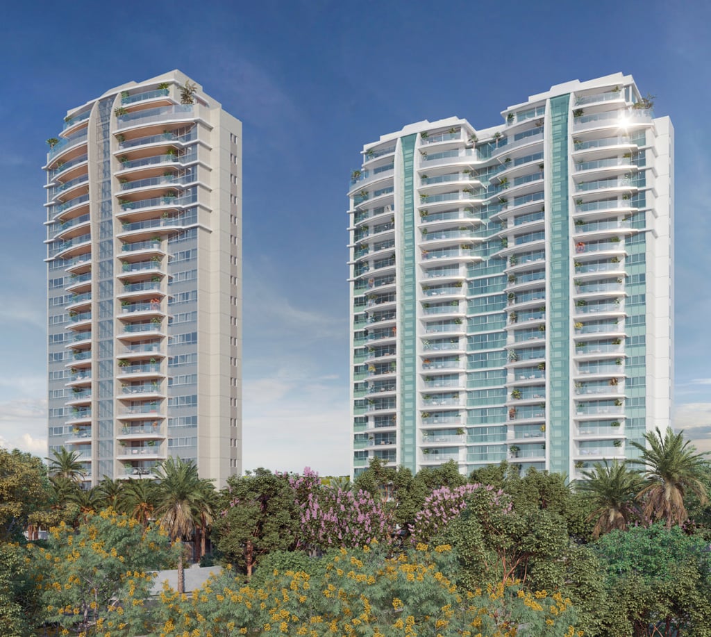 2 torres do condomínio Lake Eyre com fundo azul e abaixo o bosque do condomínio.