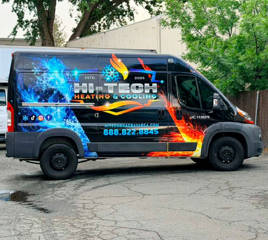 Hi-Tech Heating and Cooling service van with fire and ice graphics parked outdoors.
