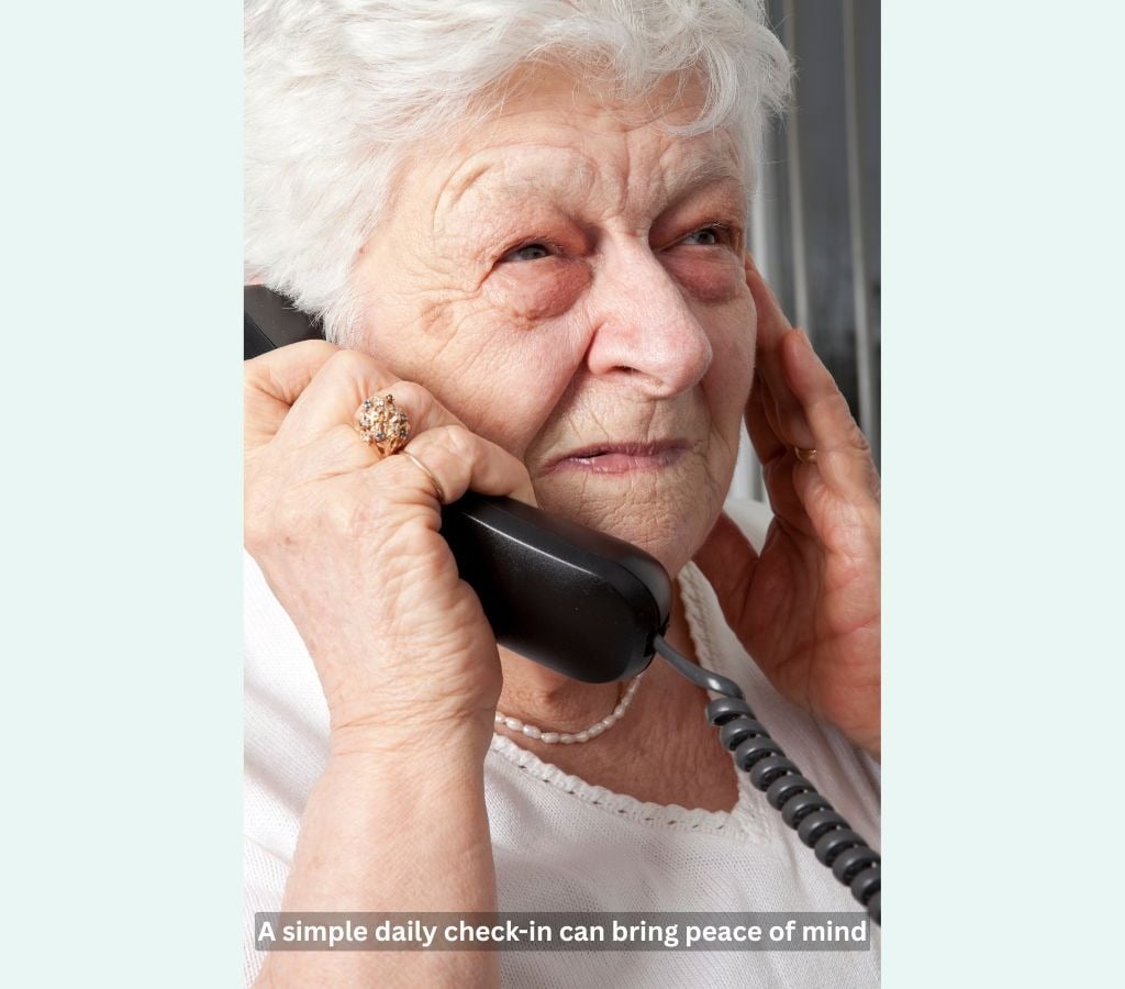 Senior receiving a daily check-in call at home for safety and support