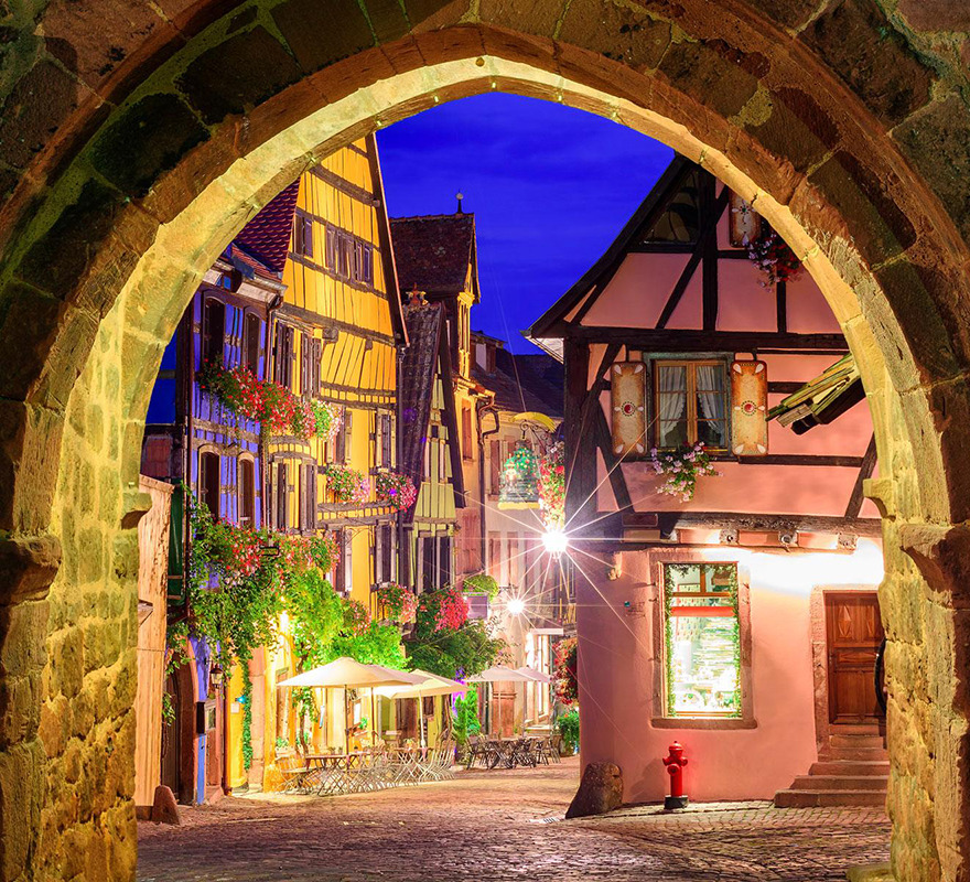 Alsace village Riquewihr colored house cobble night