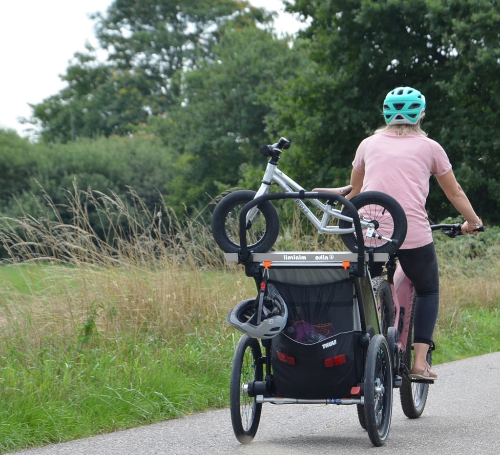 Thule-Fahrradanhaenger-Laufrad-Kinderfahrrad-Befestigung-Halterung-Spazieren-Woom-Early Rider-Pucky