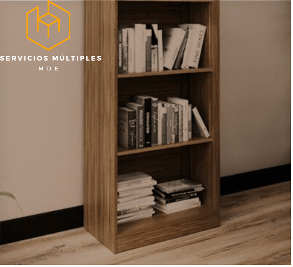 a bookcase with books on it and a plant in the background