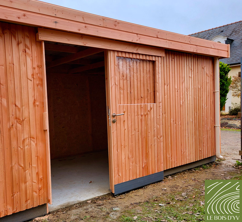 Abri de jardin en bois porte coulissante