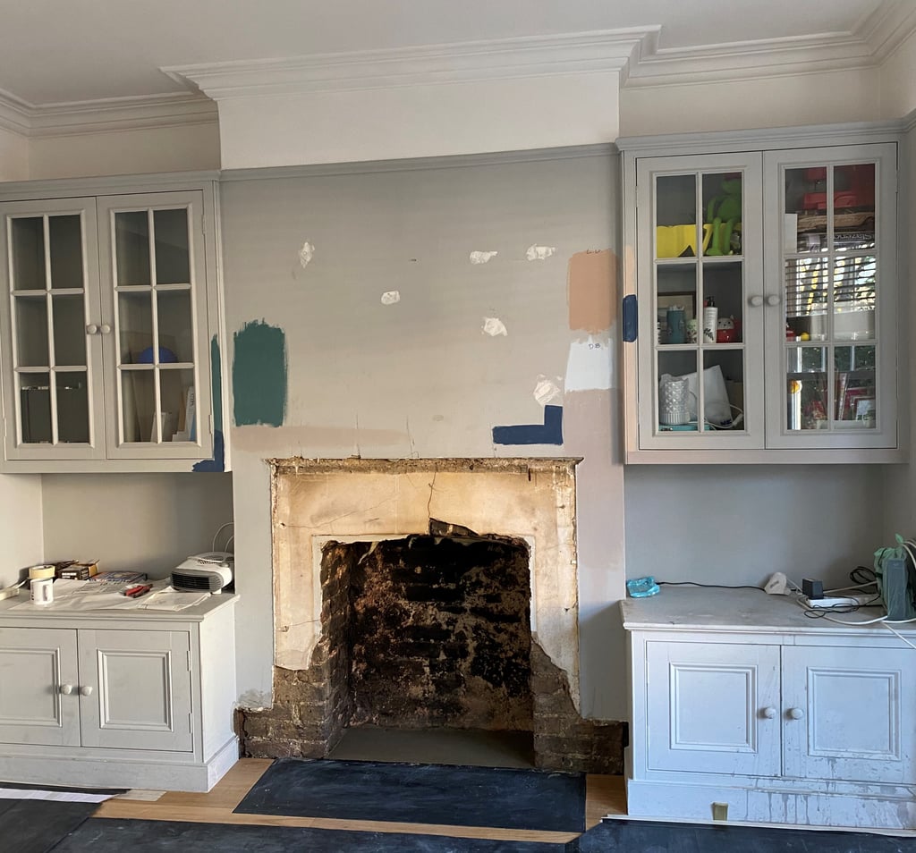 Home office under renovation, paint swatches painted on walls