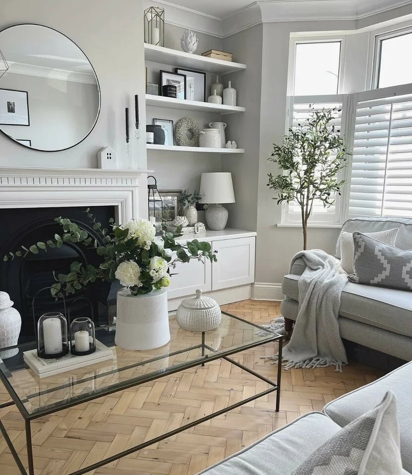 a living room with a fireplace and a couch
