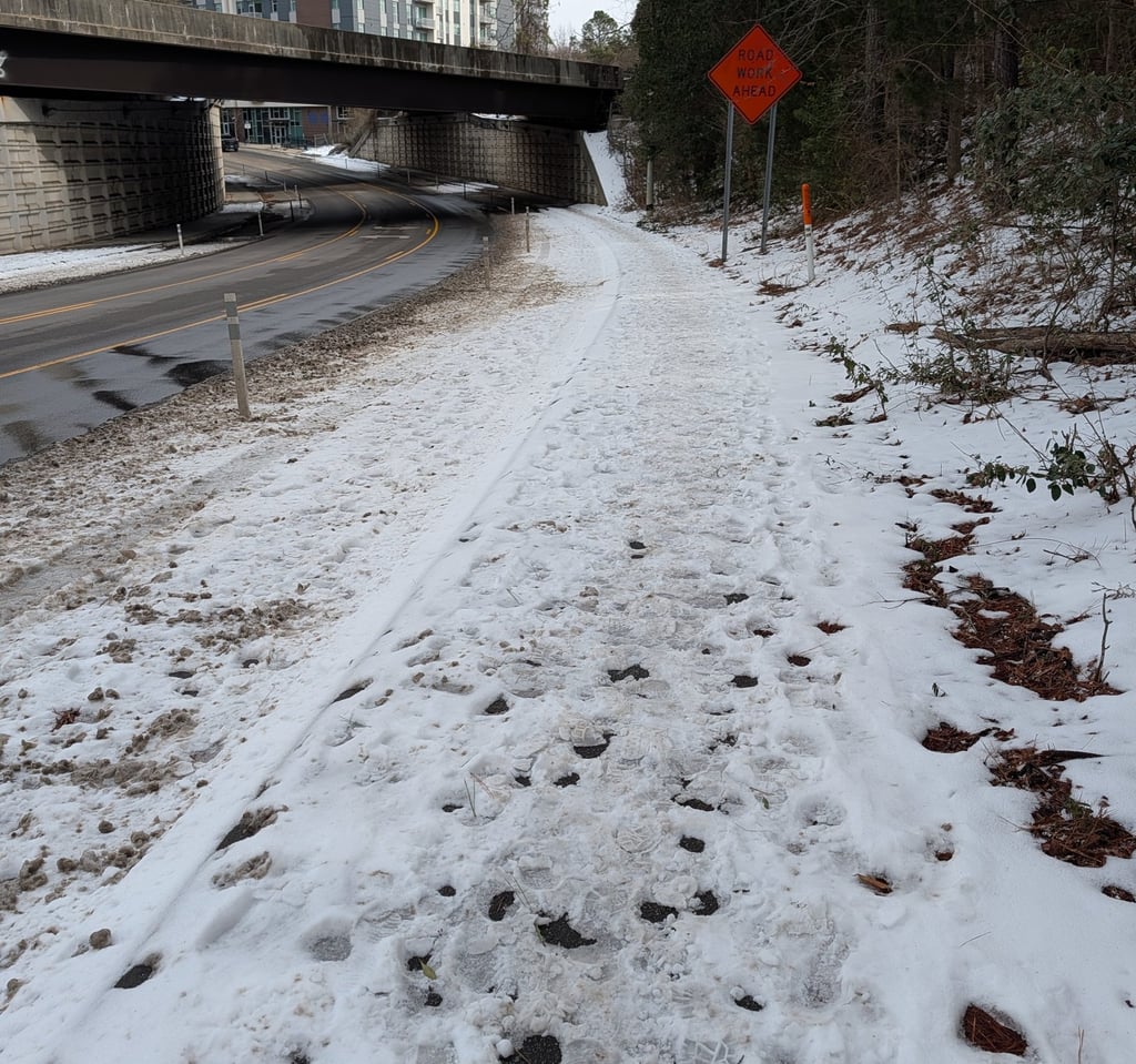snow on road near Duke Health