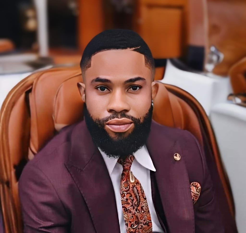 a man in a suit and tie with a beard