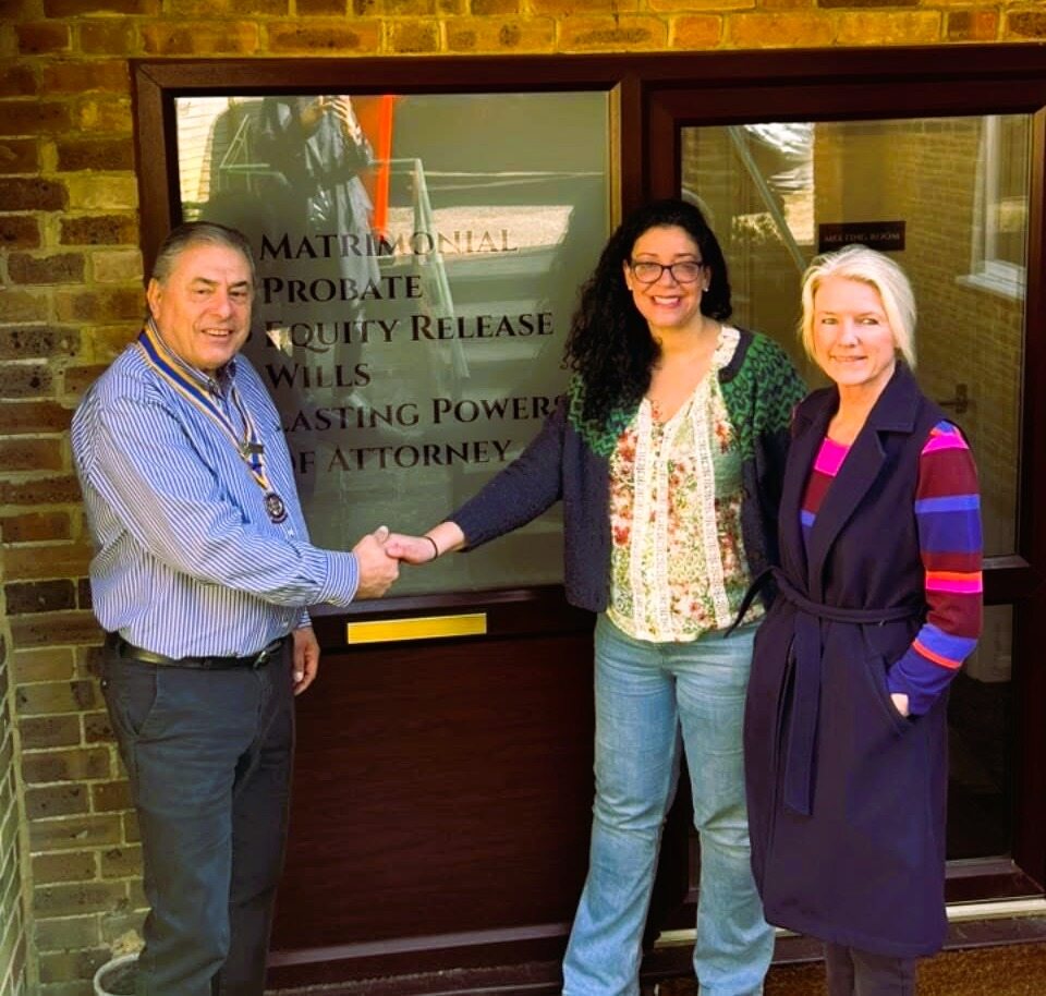 Claire Nash and Samantha Norgate with Rotary President Ken Maynard outside Claire Nash Solicitors Cr