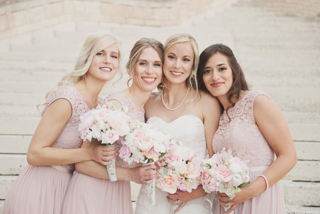 a bride and bridesmaids in a wedding
