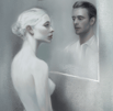 a man and woman in a white dress