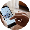 Person using a tablet, only the persons hands are visible