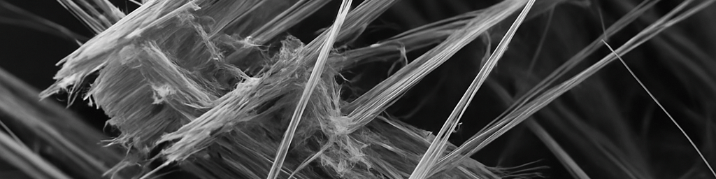 Close-up view of asbestos material being safely removed by licensed asbestos abatement professionals