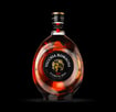 a bottle of brandy with vecchia romagna black label emblem on it