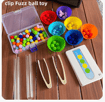 a variety of colorful plastic balls and plastic beads