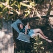 person reading a book on a retreat