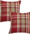 a pair of pillows with a red and beige plaid pattern