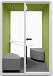 Type T-02: Two-person pod with cushioned benches and corner table, green walls and spotlights