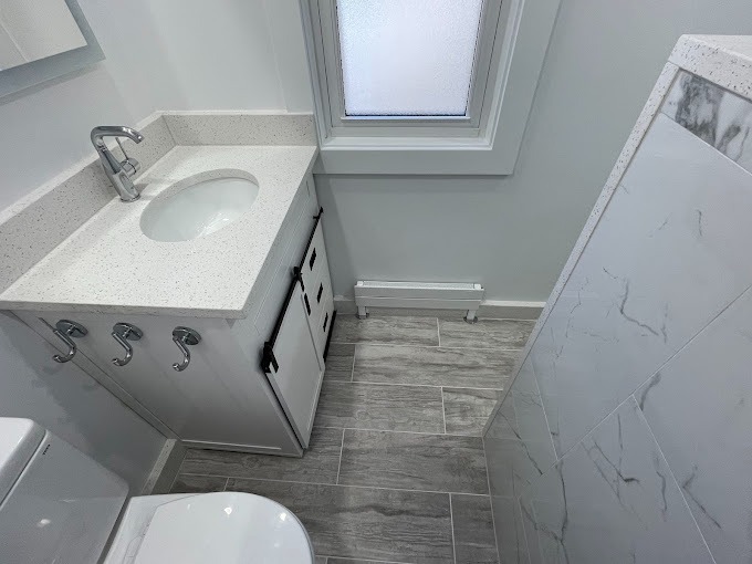 tile flooring and bathroom lighting