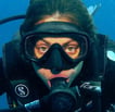 Female scuba diver underwater in Gili Trawangan Dive Site