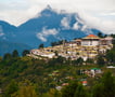 a mountaintop with a view of a mountain range