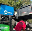 a man repairing a trailer