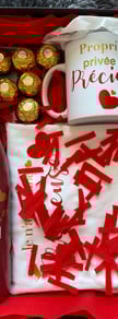 a coffee mug with a mug and chocolates