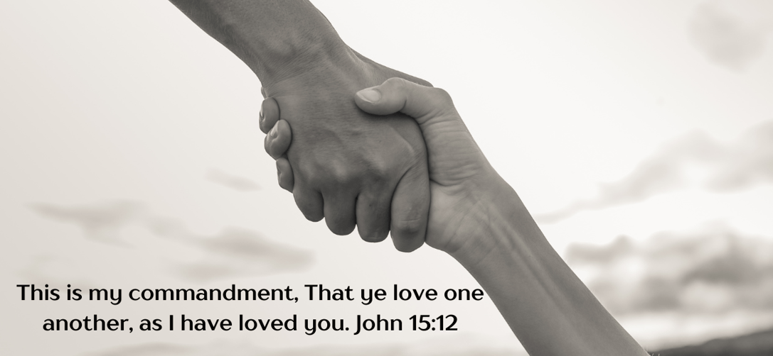 black and white photo of two hands hands together, featuring the verse John 15:12.