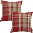 a pair of pillows with a red and beige plaid pattern