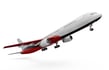 a large jetliner flying in the air