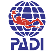 a person in a diving suit and a diving suit Padi Certification