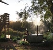 person enjoying hot tub on a retreat