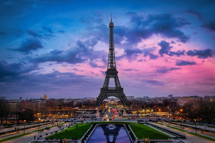 A stunning view of Paris with the iconic Eiffel Tower standing tall against the skyline