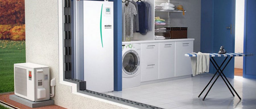 a laundry room with a washing machine and a laundry room