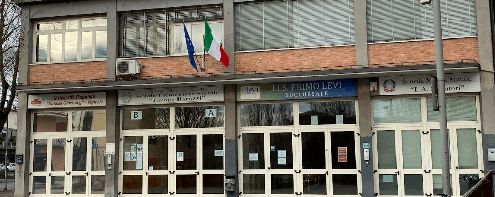 a building with a flag on the front of it