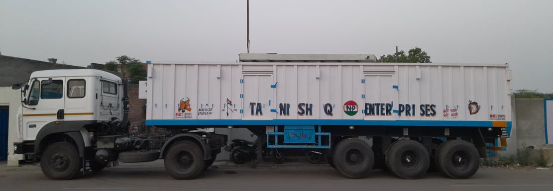 Heavy-duty Flatbed Trailer manufactured for logistics and shipping use.