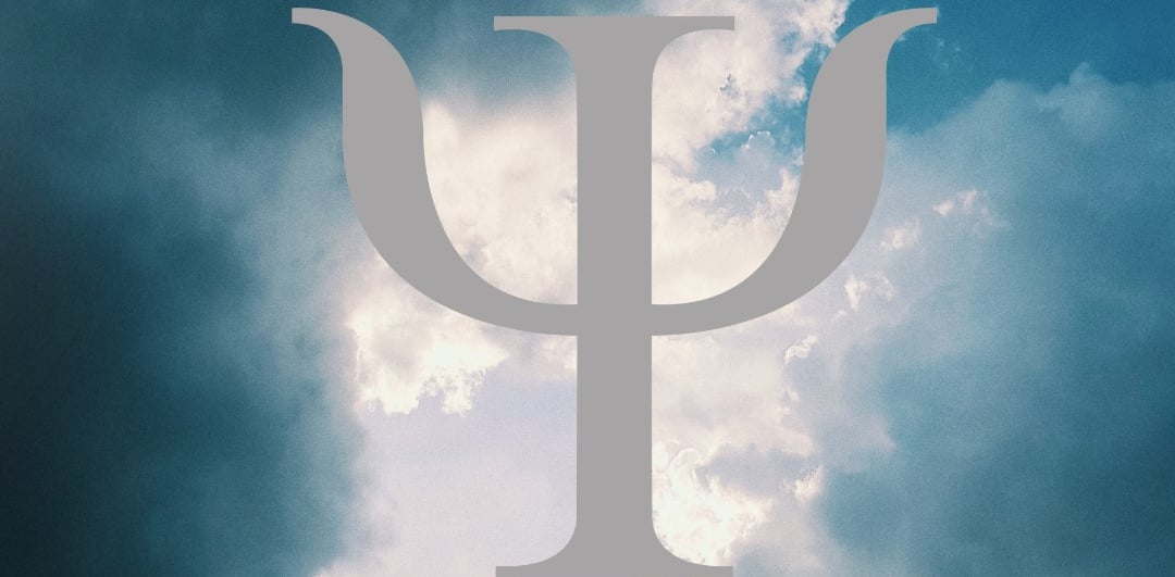 a large white letter p on a cloudy day