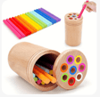a wooden pencil box with a pencil and markers