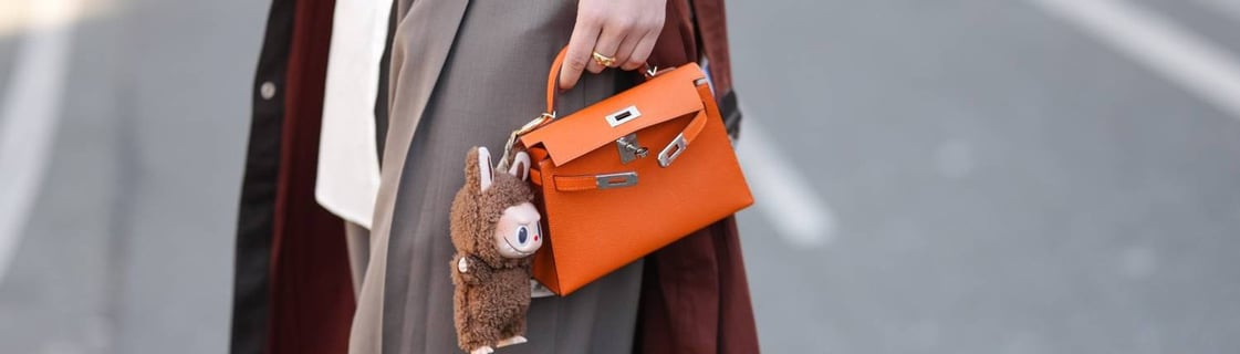 Photo of a Labubu Zimomo bag charm on a Hermes bag