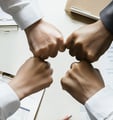 four founders fistbumping at company creation