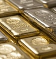 gold and silver bullion in stacks
