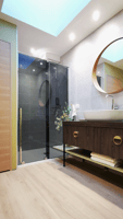 Salle de bains avec douche italienne, portes coulissante. Meuble bois, vasque blanche posée sur plan