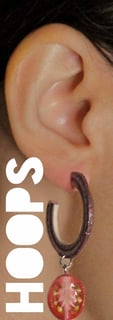 a woman with a hoop earring 