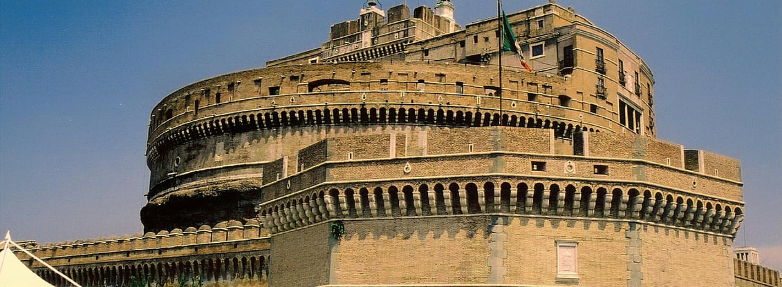 a group of people standing around a building