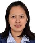 a woman in a blue jacket and a blue shirt