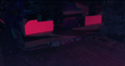 Frame from visual animation - DeLorean car trunk view with taillight glow