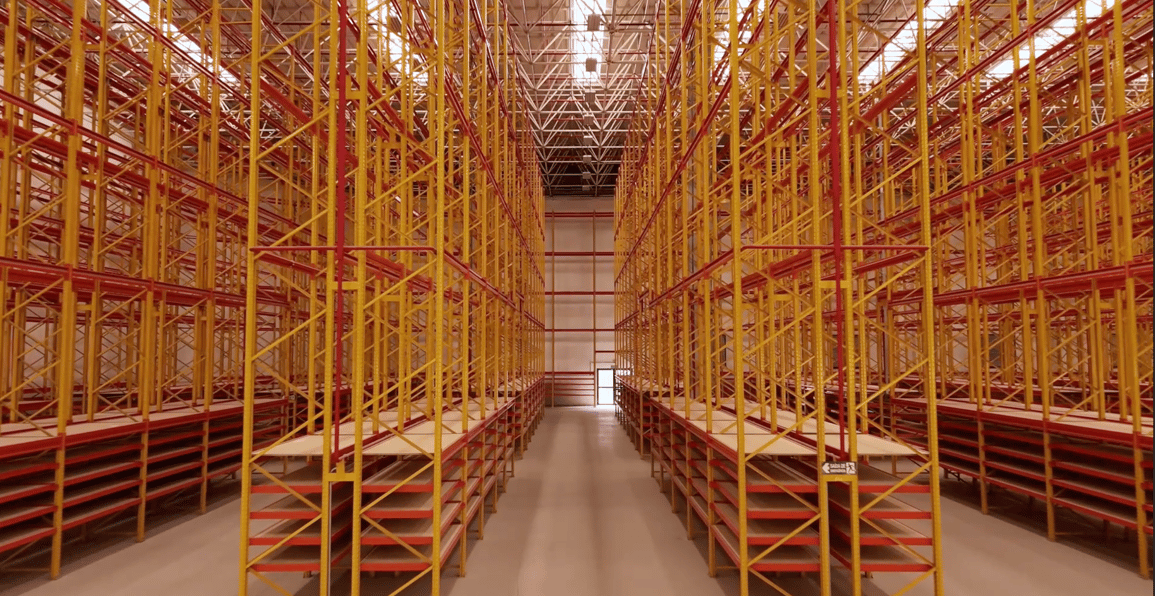 a large warehouse with lots of shelves and shelves