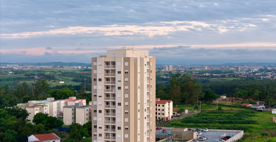 a tall building with a clock tower in the middle of it